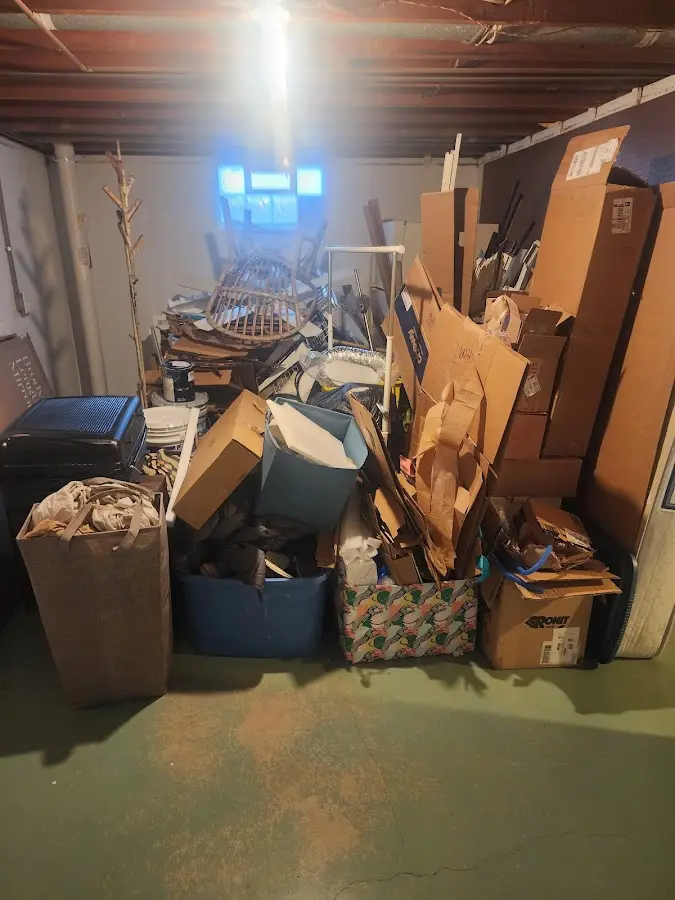 Roll-off dumpster container at job site for 2 Yard Dumpster Rental in Bixby